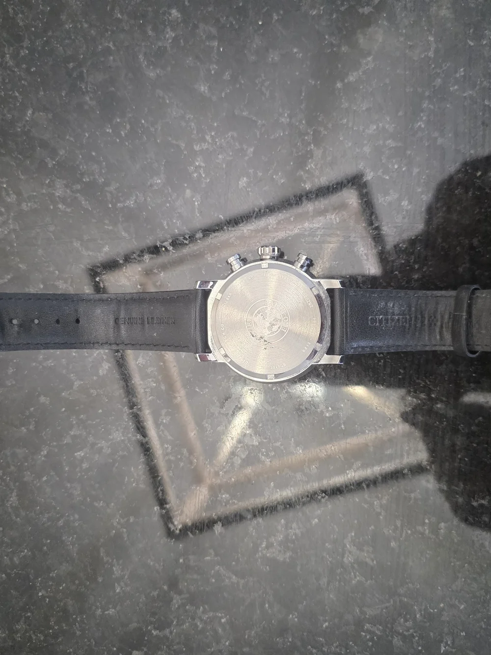Citizen Eco-Drive Brycen Chronograph, model CA0649-14E. The black dial, red acc